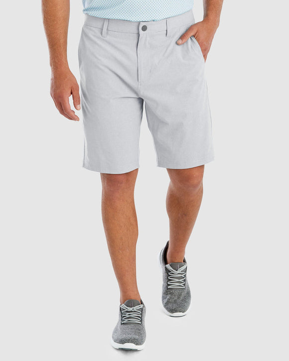 Lower half of man wearing chrome Calcutta shorts