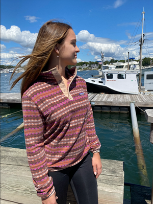 Woman wearing multicolor Patagonia fleece